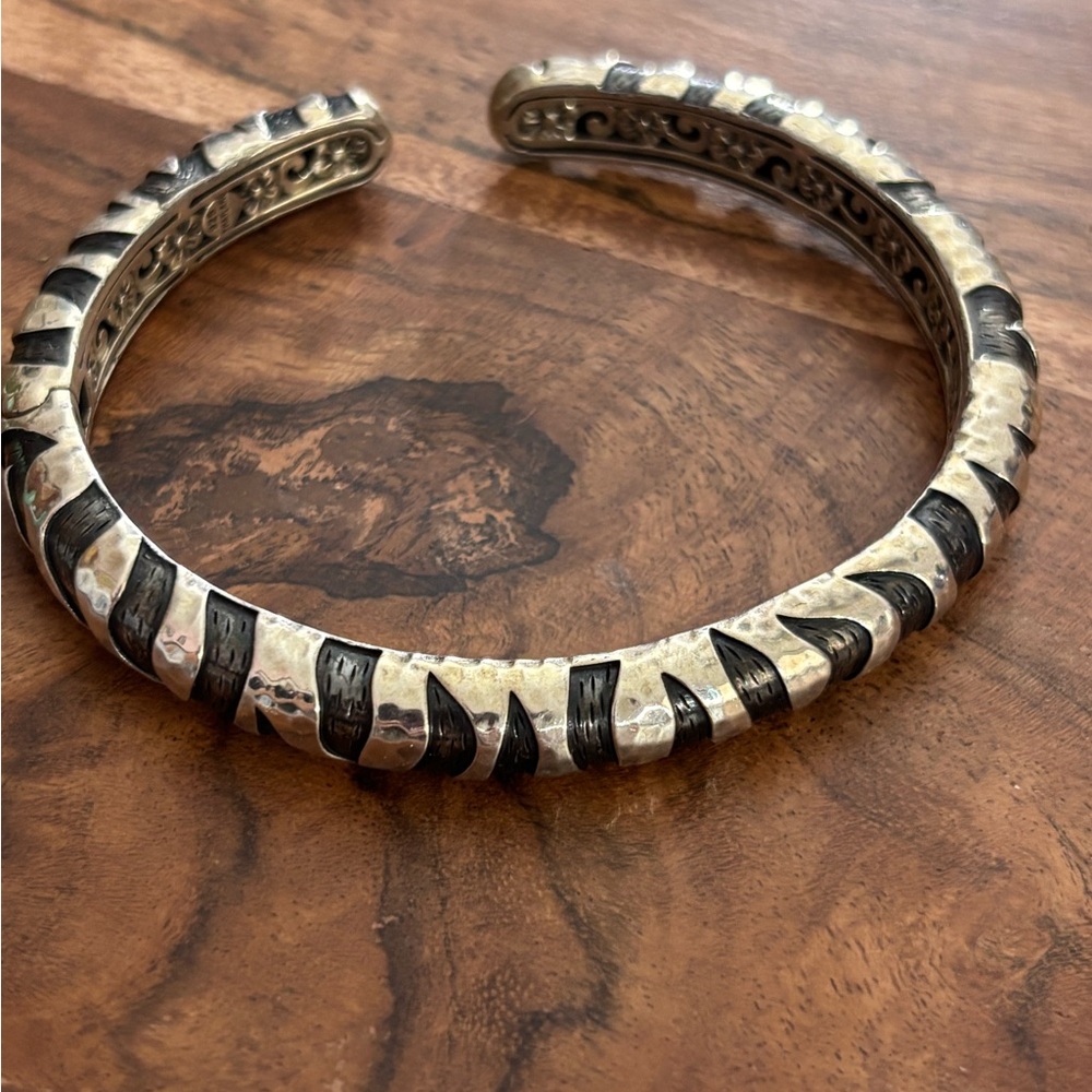 Hammered Silver Tone Cuff Bracelet with Black Accents